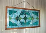 Flawless stained glass framed measures 43" x 22.5"