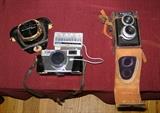 Canon Canonet QL17 (early 1970s) and Argus Argoflex (1940-51) cameras in leather sheath.