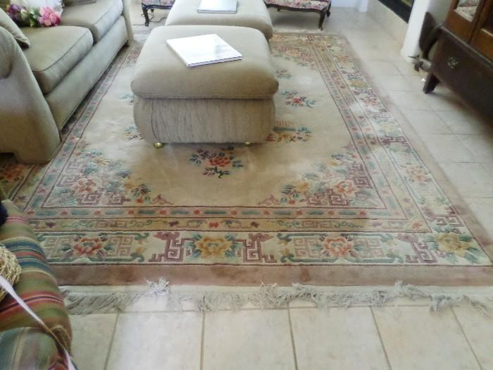 Large area rug, sofa with matching ottomans