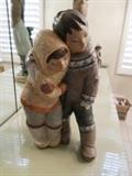 Lladro Eskimo boy and girl