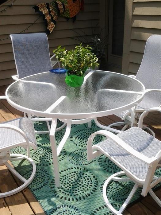 Blue/white 5 pc. Patio set all chairs swivel and rock