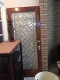 Oak and glass entry way doors purchased new never installed - we have two !!! 
