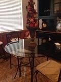 Beautiful black metal table with 4 chairs plus black hutch - very nice 
