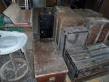 large antique trunks, clay turn table, antique wood chipper