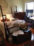 Antique mahogany four poster bed, vintage linens, antique leather trunk, vintage canes