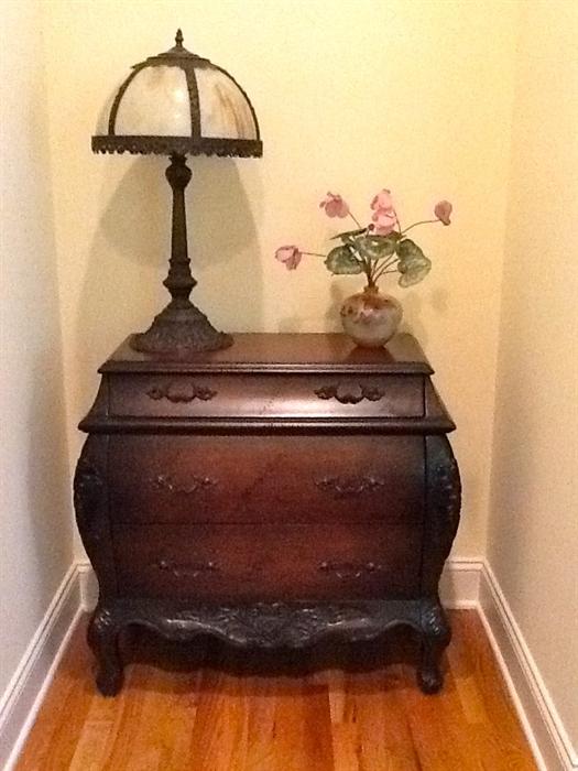 Bombe chest with glass shade lamp