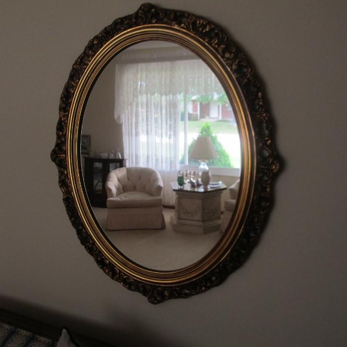 ONE OF SEVERAL DECORATIVE MIRRORS