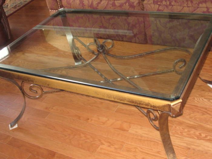 beveled glass top and iron coffee table