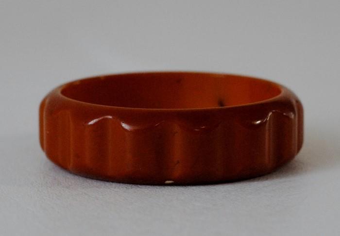 Bakelite Bangle - Amber brown colored Bakelite bangle with  rounded rectangular carvings

