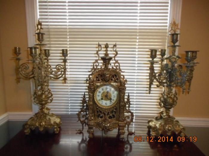   French Brass 19th century Clock and candelabra set with keys and snuffers.A rare find and a must see!!!!