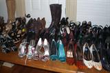 many many high end designer shoes.Christian Dior,Jimmy Choo,Louboutin .Vuitton,Gwen L.A.M.B many pair plus so many more designers.