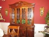 Beautiful wood china cabinet lighted with matching dining table and chairs with side board.  