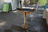 Antique cast iron bird bath