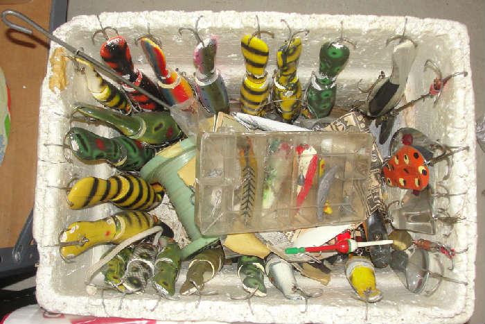 Tons of fishing lures and other goodies.  Four boxes full!!