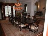 MILLENDER FURNITURE COMPANY. FOURTEEN CHAIRS AND TRI-PEDESTAL TABLE