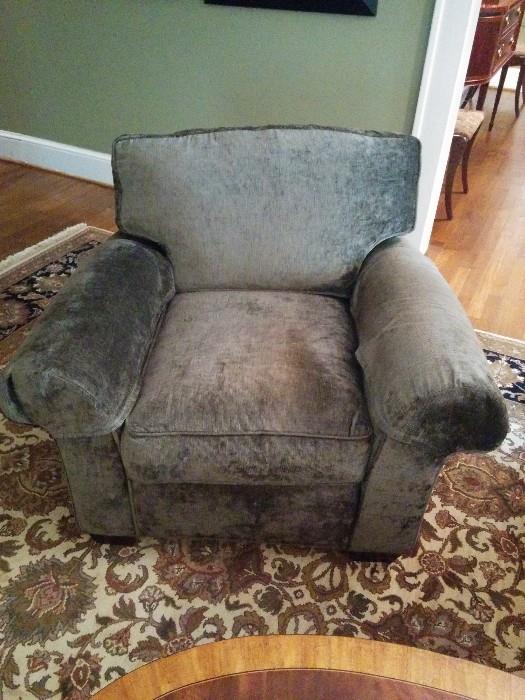 One of a pair of upholstered armchairs, from Pottery Barn
