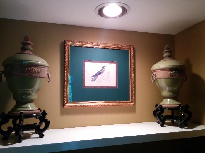 Pair of celadon urns, with lids, on good quality wood bases - made in Argentina; nicely framed and matted hummingbird print. They like it when you change their sugar water every 2-3 days.