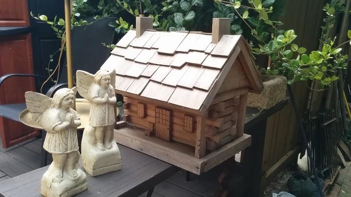 Artist-built birdhouse, with two protective angels