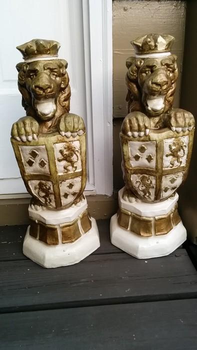 Pair of lovely, equally protective lions, all gussied up in gold spray paint