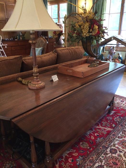    Gorgeous 84" round drop leaf table (seats 8-10)