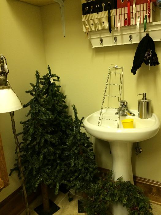      Big and small Christmas trees; ribbon dispenser