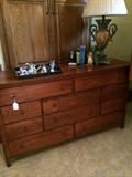       Dresser has matching armoire & nightstand