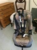              Storage chest; antique chair; baby seat