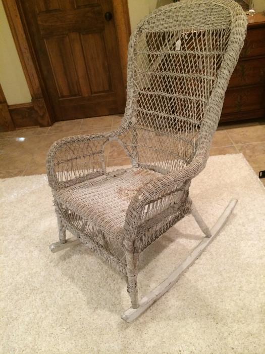                        Extremely old wicker rocker
