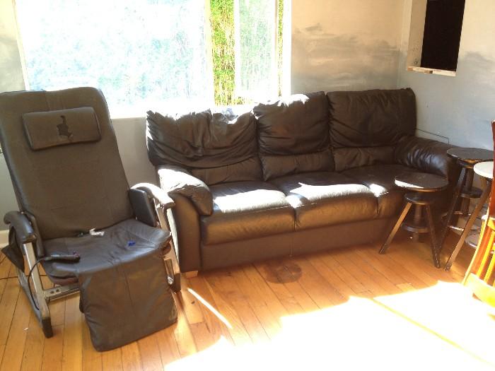 black leather couch, reclining electric massage chair