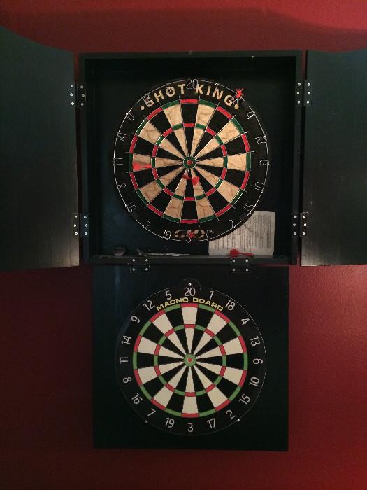                   Dart boards with doors that close