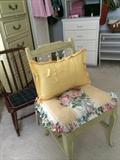                  Desk chair with decorative pillows