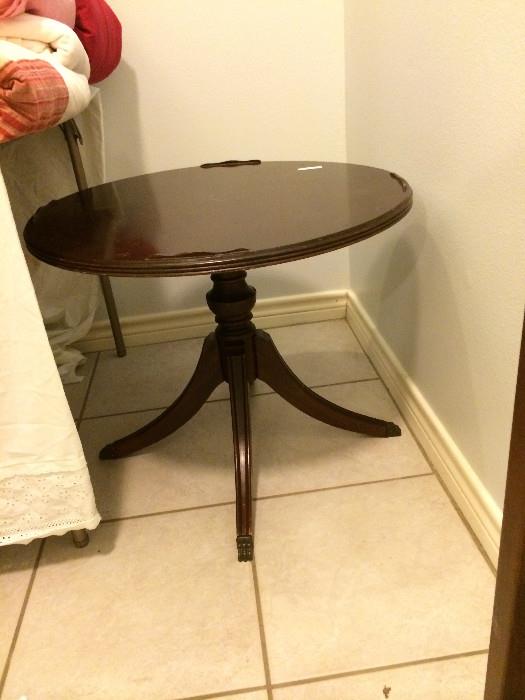                             Small round side table