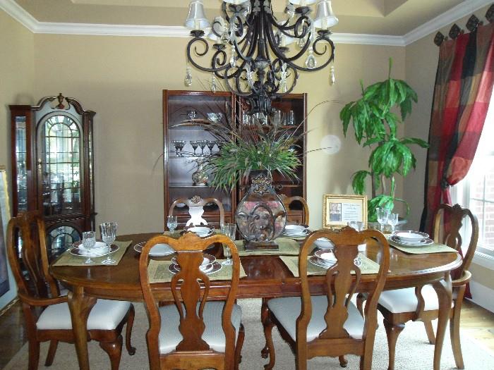 Dining Table w/ 2 extended table inserts.. Measures 92 inches...Matching Chairs....