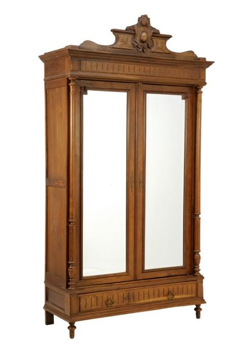 LOT 64: A RENASSIANCE REVIVAL TWO-DOOR ARMOIRE