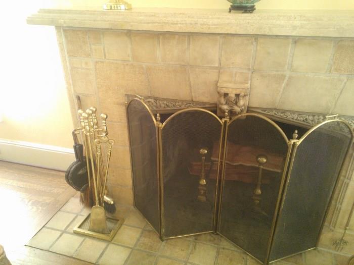 All brass andirons, screen and brass fireplace tools
