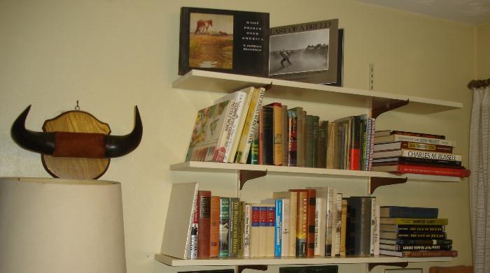 Mounted steer horns, books