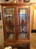 beautiful stained-glass front bookcase made by our client