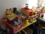 TONS of vintage toys from the late 1950's to the mid 1970's These are some of the Barbie and Fisher-Price items. Some are well-enjoyed, but many still have original boxes. Again, I will try to post more shots