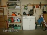 Miscellaneous Plastic Shelving, and cabinet unit, great for the garage.