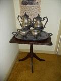Pedestal small table with tea service