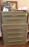 Sage green painted chest on chest.