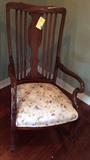 Antique mahogany upholstered rocker.