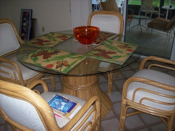 Rattan table w/ 4 chairs $350.00