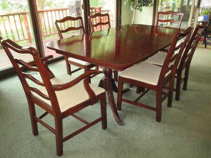 Dining table shown with just one leaf