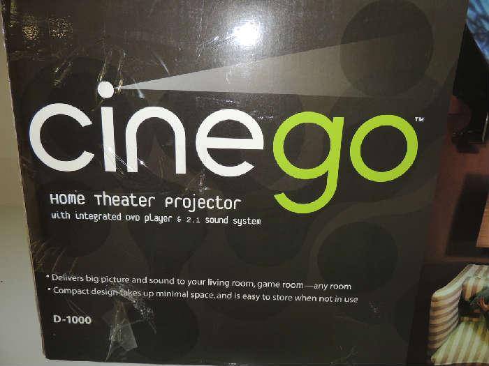 "Cingo" HomeTheater Projector, delivers big picture and sound in the home.  Easy to store. in new condition!