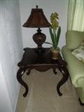 Queen Anne style side table with table lamp.  There are two tables and two lamps