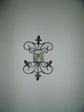 One of a pair of sconces in master bedroom