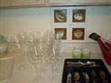 Glass stemware, flatware and decor in kitchen