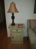 Side table/night stand with pineapple lamp.  Table matches armoire