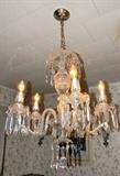 Waterford crystal Avoca chandelier. Has extra crystals. This is in working condition. Buyer has option to have your own licensed electrician remove at buyers cost or at buyers request Caring Transitions staff will remove for you provided waiver is signed not holding Caring Transitions responsible for condition upon arrival at new location.